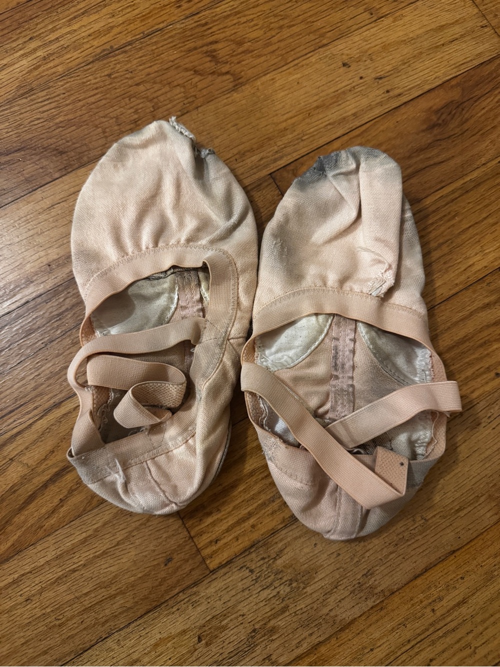 Well worn flat ballet canvas shoes